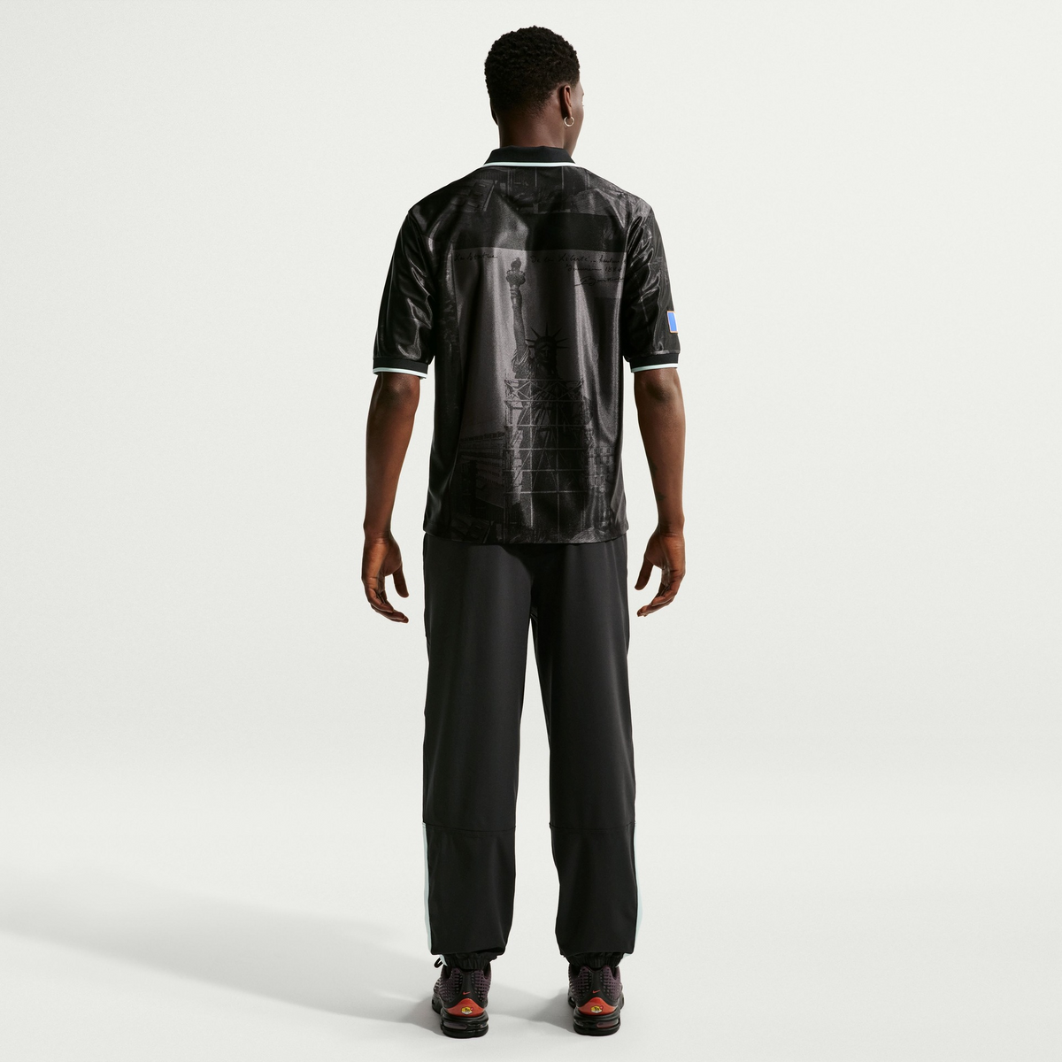 Camiseta França Dri-FIT Nike Energy Masculina, vista de costas