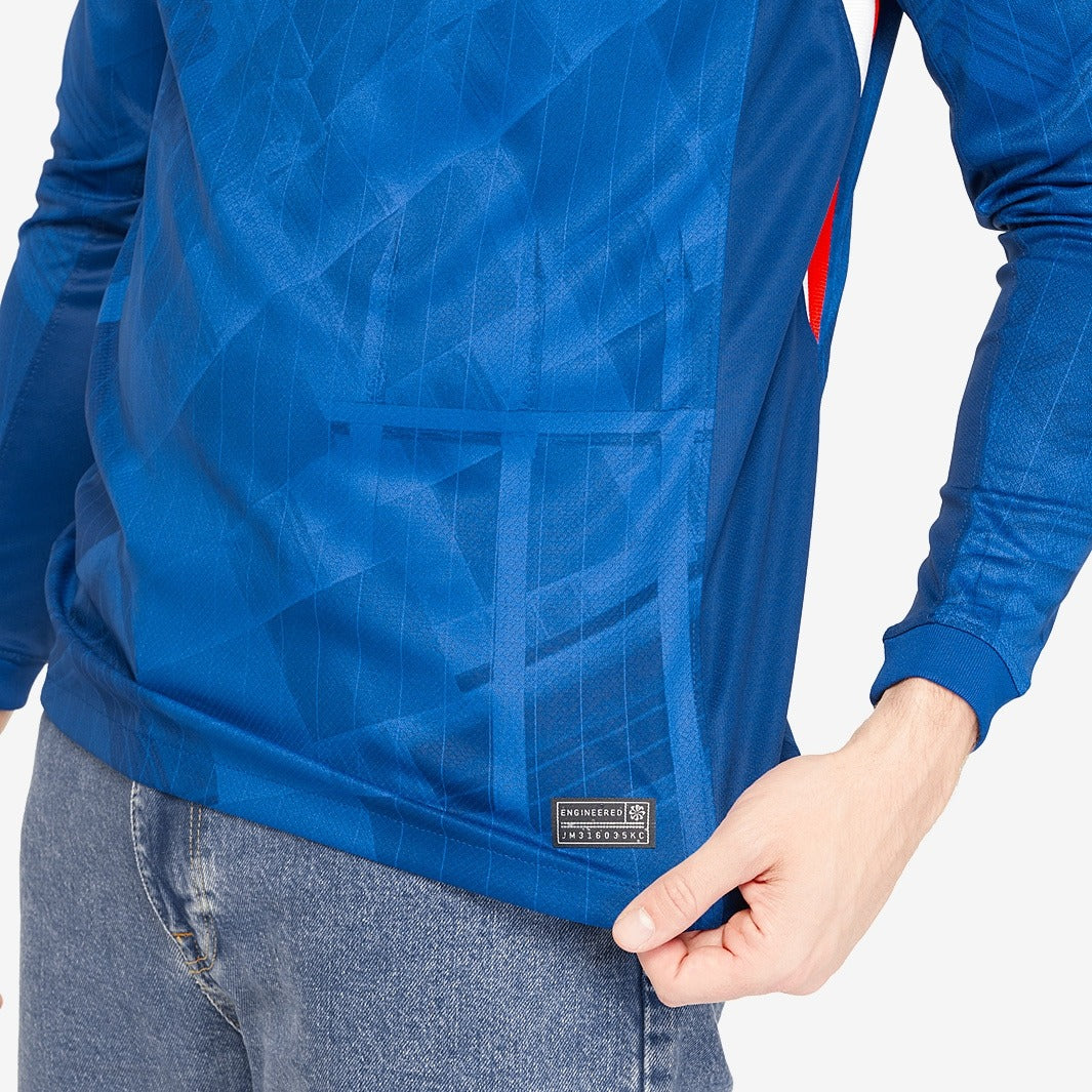 Camisa Nike Chelsea 2025/26 I Manga Longa Torcedor, detalhe do escudo