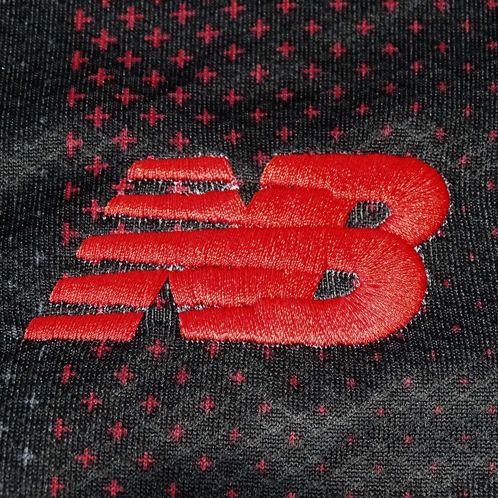 Camisa Bayer Leverkusen 2025/26 I, detalhe do tecido