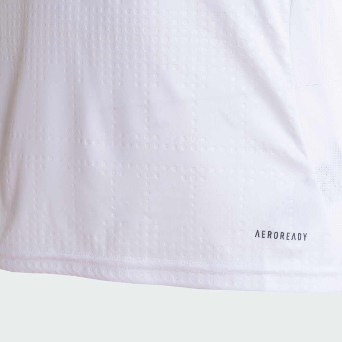 Camisa Adidas Internacional 2025/26 II A. PATRICK N° 10, detalhe do escudo