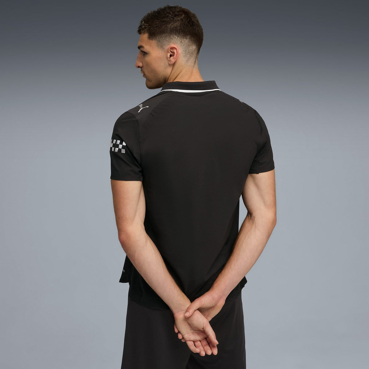 Camisa Manchester City 2025/26 II, detalhe do escudo