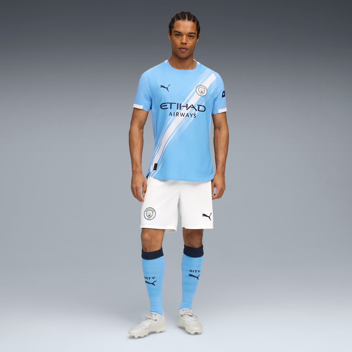 Camisa Manchester City 2025/26 I, detalhe do escudo