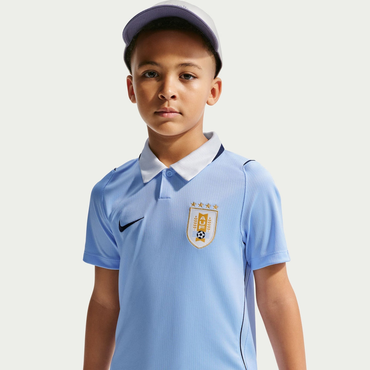 Conjunto Infantil Uruguai 2026/27 I Kit, vista de frente