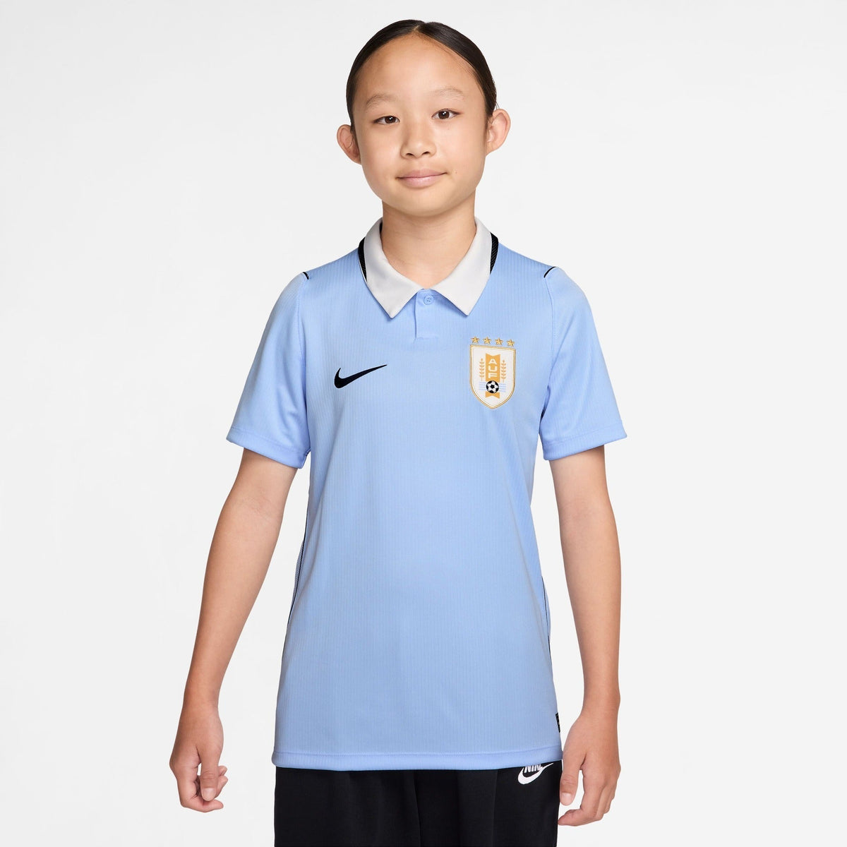 Conjunto Infantil Uruguai 2026/27 I Kit, vista lateral
