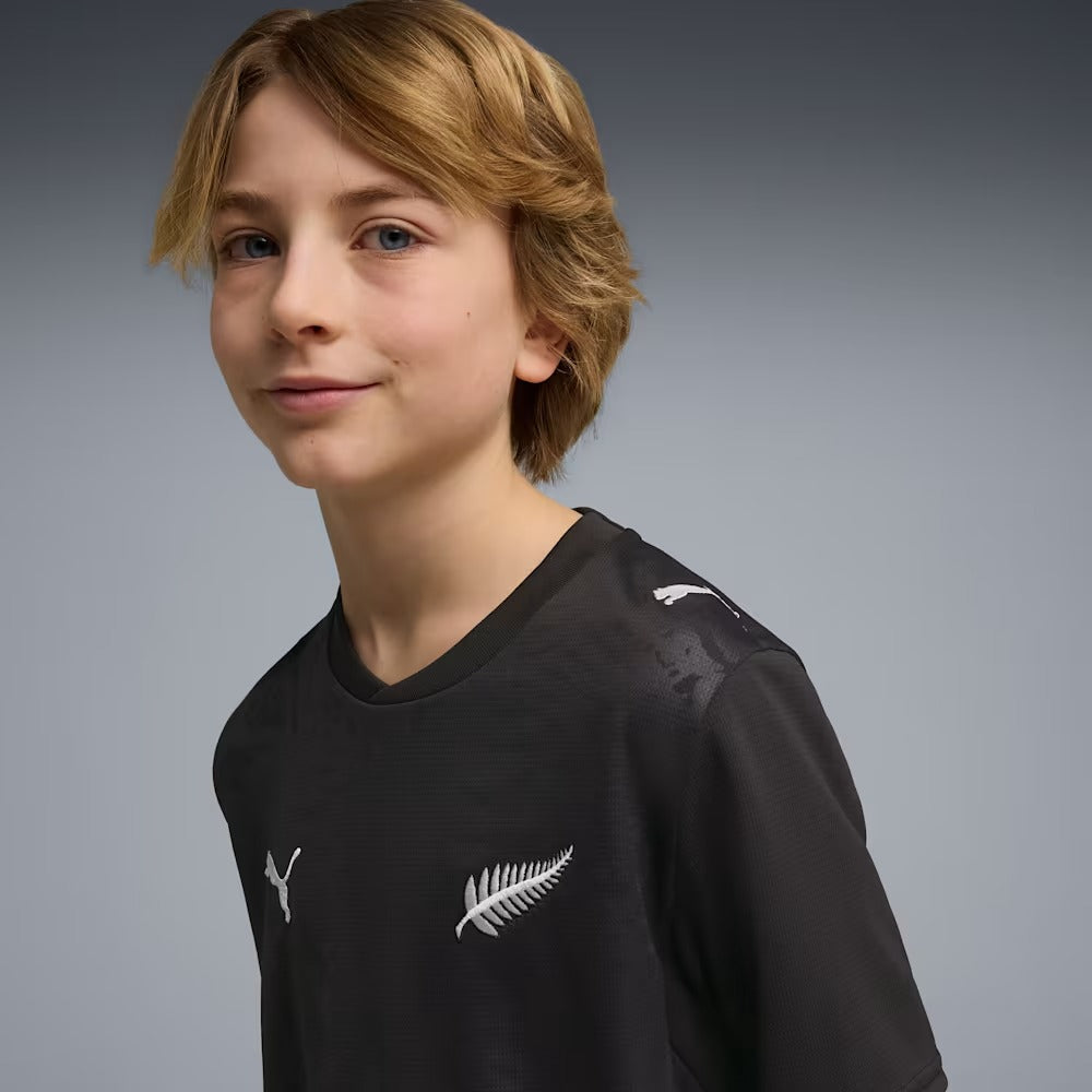 Camisa Infantil Nova Zelândia 2026/27 I, vista de costas