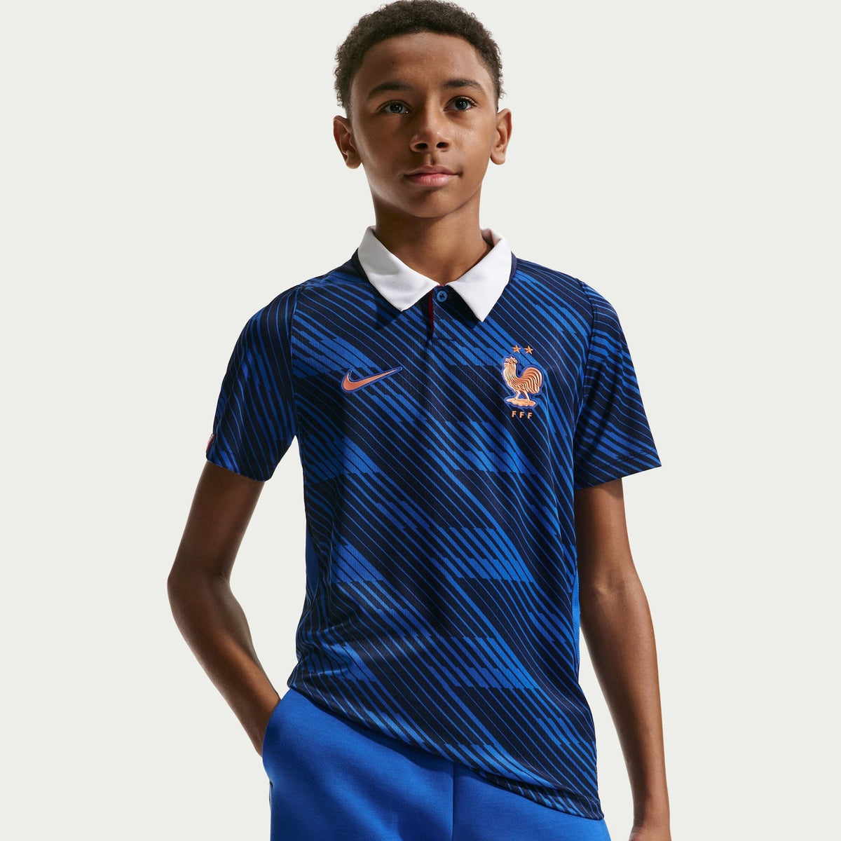 Conjunto Infantil França 2026/27 I Kit, vista de frente